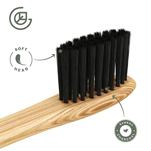 Bamboo toothbrush with black bristles and soft head label.