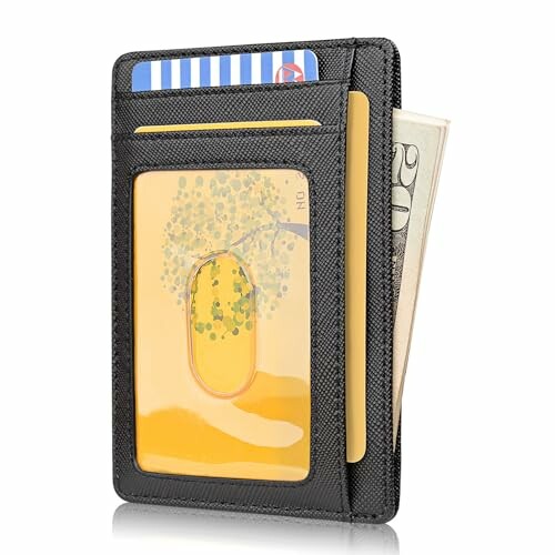 Slim black wallet holding cards and cash